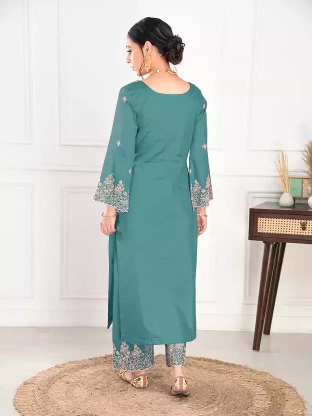 elegant green embroidered suit with graceful dupatta detailing elegant green embroidered suit with graceful dupatta detailing
