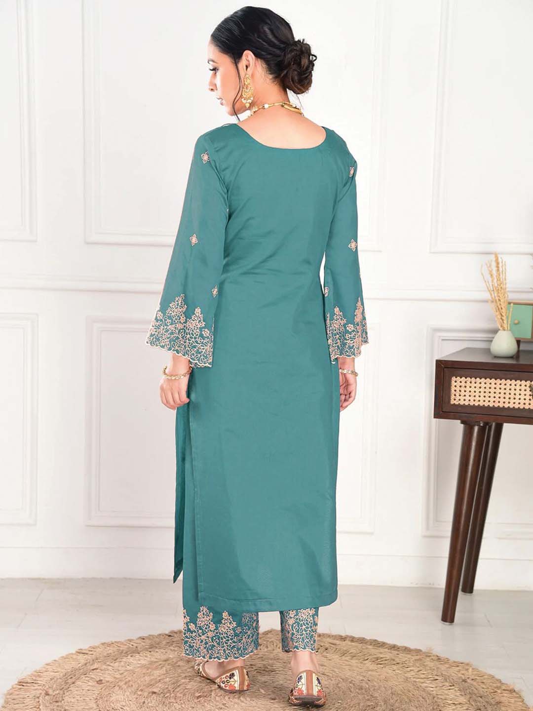elegant green embroidered suit with graceful dupatta detailing elegant green embroidered suit with graceful dupatta detailing